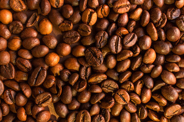 Roasted coffee beans background. Coffee making concept