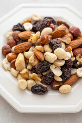 Dried fruits with nuts. Cashew, hazelnuts, peanuts, dried apricots, viburnum, raisins.