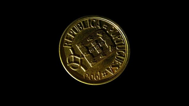 Rotating obverse of Portugal coin 5 escudos 1999 with inscription meaning  PORTUGUESE REPUBLIC. Isolated in black background.