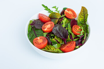 Bowl of fresh salad with tomatoes. Italian salad