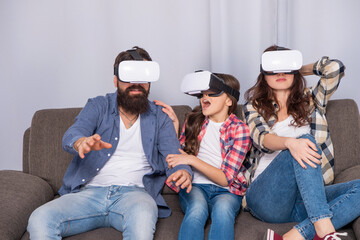 surprised mother father and daughter in virtual reality glasses, vr