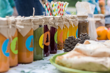 Spring time. food at the vegetarian festival. natural fruit drinks, jam and buns.