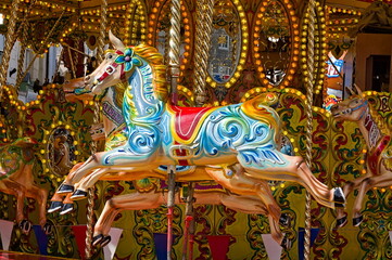 merry go round horse at the fun fair © Tony