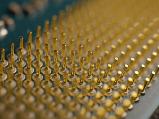 Obraz premium Smooth, gold-plated laptop processor legs