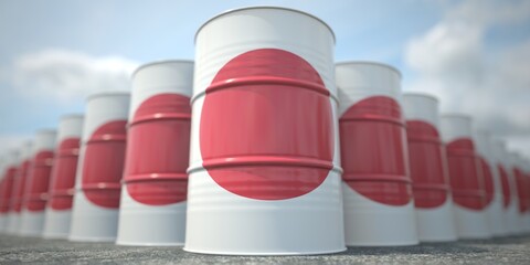 Barrels or oil drums with flag of Japan. Petroleum or chemical industry related 3D rendering