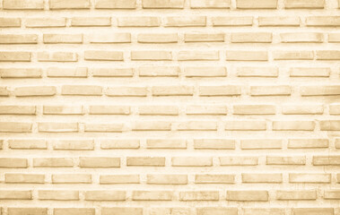 Cream and white brick wall texture background. Brickwork and stonework flooring backdrop interior.