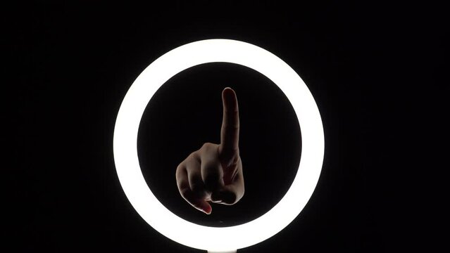 pack of gestures. female hands close-up make figures from fingers. finger play. points his finger up. Hey, you. we need you. we're watching you