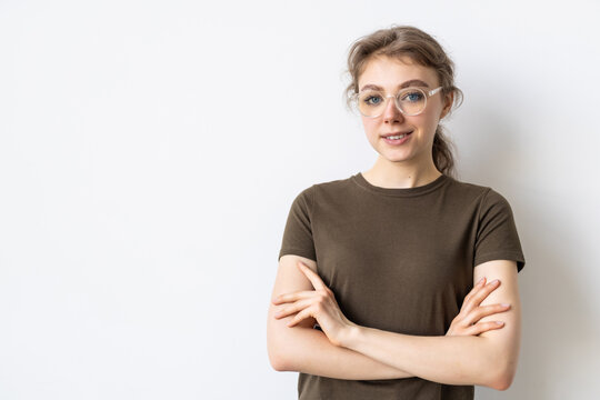 Portrait Of Confident Woman Feeling Ready And Determined, Cross Arms On Chest Self-assured Looking At Camera, Standing Against White Background