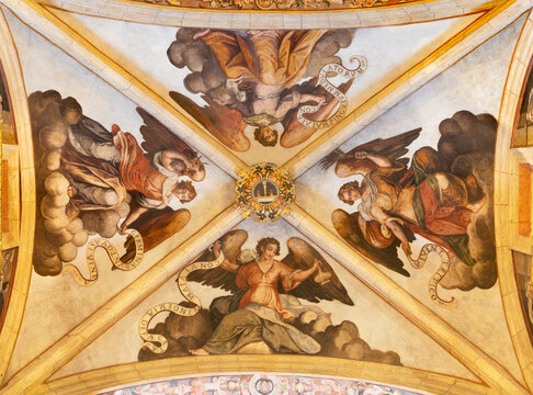 VALENCIA, SPAIN - FEBRUARY 15, 2022:  The ceiling fresco of angels with the eucharist atributs in the church Iglesia del Patriarca by Bartolome Matarana (1550-1625).