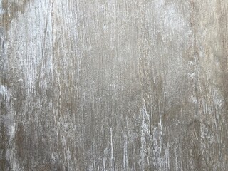 an irregular whitewashed gray wall