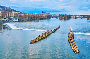 The wooden icebreakers and rapids on Vltava River, Prague, Czech Republic