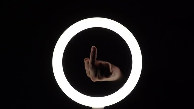 gesture package. female hands close-up make figures from fingers. finger play. Middle finger up. Obscene gesture fuck yourself