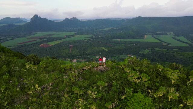 Mauritius, view from the mountain at sunset, Black River Gorges National Park Mauritius during sunset,couple man and woman watching sunset
