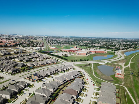 Top View Urban Sprawl And Residential Neighborhood To Horizontal Line With Elementary School District In Irving, Texas