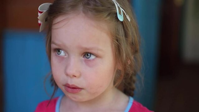 The little girl child was offended and pouted. The child says she is offended.
