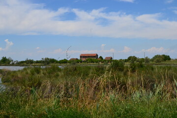 Fototapeta na wymiar House in the fields at the Venetian lagoon