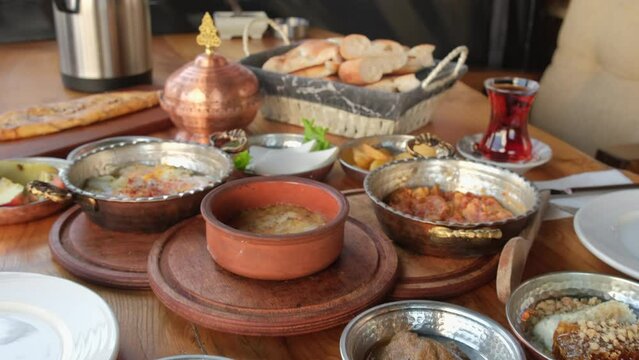 Traditional rich Turkish village breakfast on the wooden table