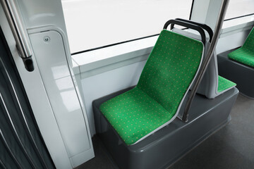 Public transport interior with comfortable green seats
