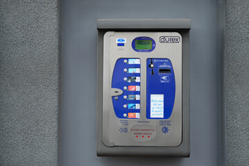 Ripe (AN), Marche, Italy – APRIL 07, 2022: Durex condom vending machine on grey wall