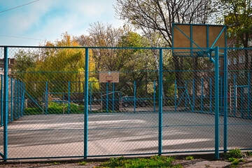 Basketball court open air no people.