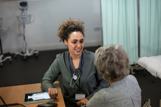 Female Medical Doctor giving patient results