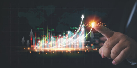 Businessman touching point virtual screen economic growth graph chart. Analysing trading of stock...