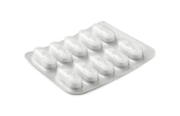 Calcium supplement pills in blister pack on white background