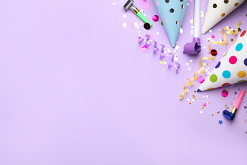 Beautiful flat lay composition with festive items on violet background, space for text. Surprise...