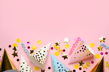 Flat lay composition with hats and other festive items on pink background, space for text. Surprise party