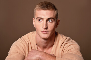 Obraz premium Portrait of handsome young man posing in studio