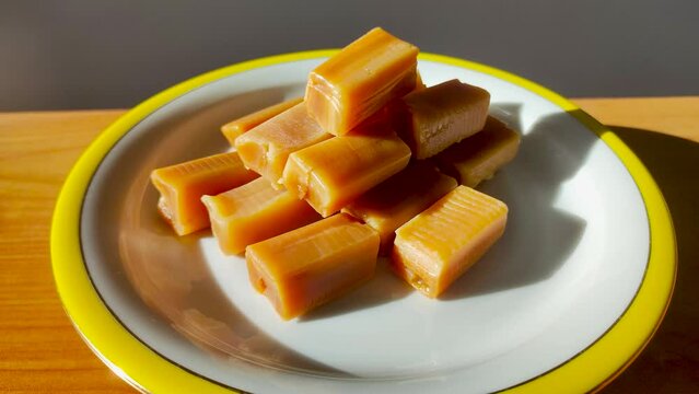 Rotation of Polish traditional cream fudge known in Poland as krowki meaning little cows.