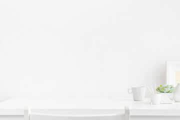 Home office, creative desk with office supplies and empty table space. White workspace.