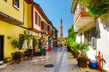 Fototapeta na wymiar The Kesik Minare and an old street in Kaleici, Antalya