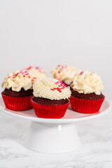 Red Velvet Cupcakes with White Chocolate Ganache Frosting