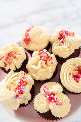 Red Velvet Cupcakes with White Chocolate Ganache Frosting
