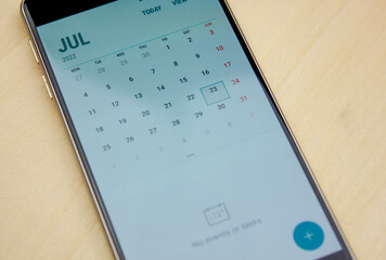 Calendar on a smartphone.Scheduling dates.Label on a calendar on a smartphone.