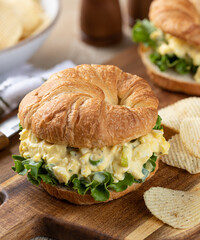 Egg salad sandwich on a croissant