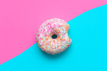 Sugar donut split into half portion to reduce unhealthy food quantities