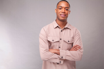 Portrait of smiling man in beige shirt