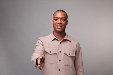 Man making handshake gesture