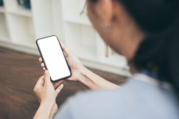 cell phone blank white screen mockup.hand holding texting using mobile on desk at office.background empty space for advertise.work people contact marketing business,technology