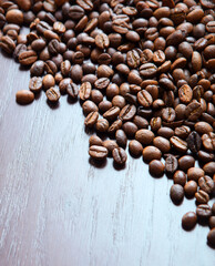Coffee grains on a wooden table