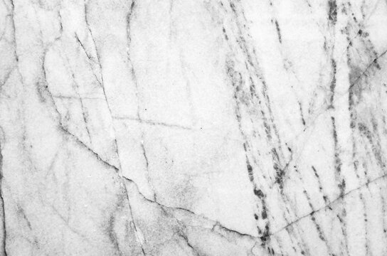Natural white marble with pattern of gray veins,