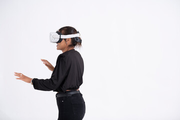 Studio shot of young woman wearing VR headset