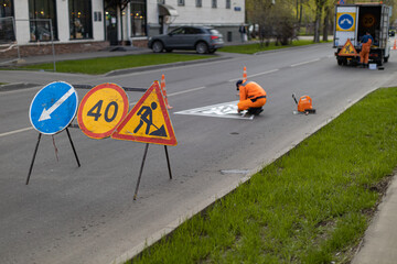  road sign warning of repair work