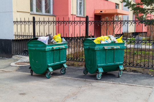 dumpsters near the residential building