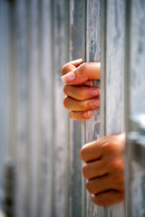 hands in jail