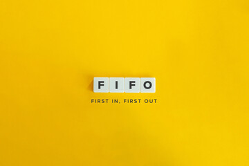 FIFO (first in, first out) Banner. Letter Tiles on Yellow Background. Minimal Aesthetics.