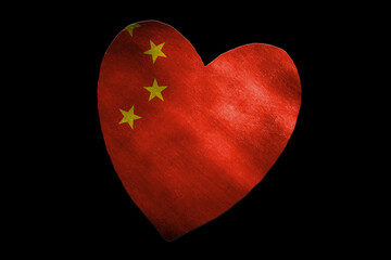 Heart shape of the Chinese flag on black background