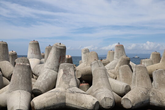 concrete tetrapods or dolos. wave barriers in the sea